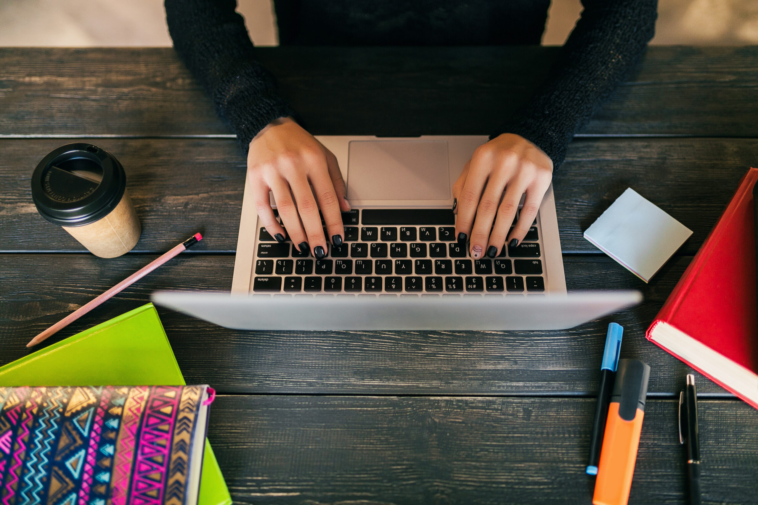 young woman working on laptop in co working office 2026 01 05 06 00 59 utc scaled tronos