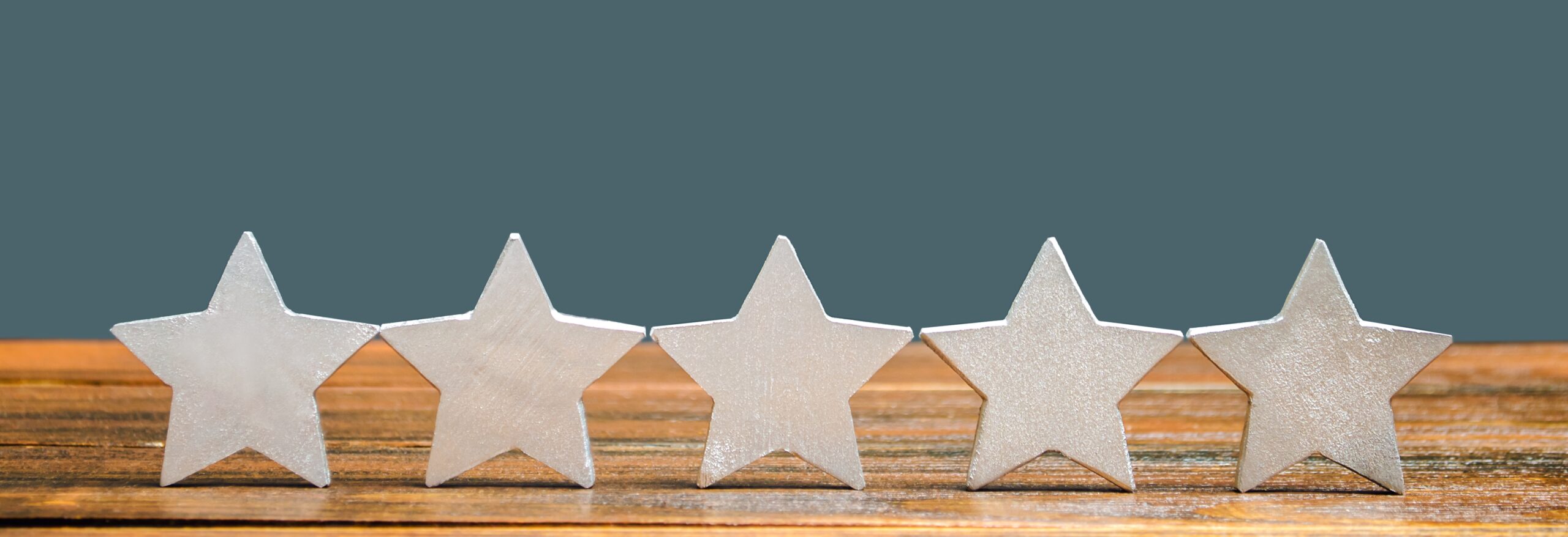five silver stars on a wooden surface 2026 09 24 05 29 29 utc scaled tronos