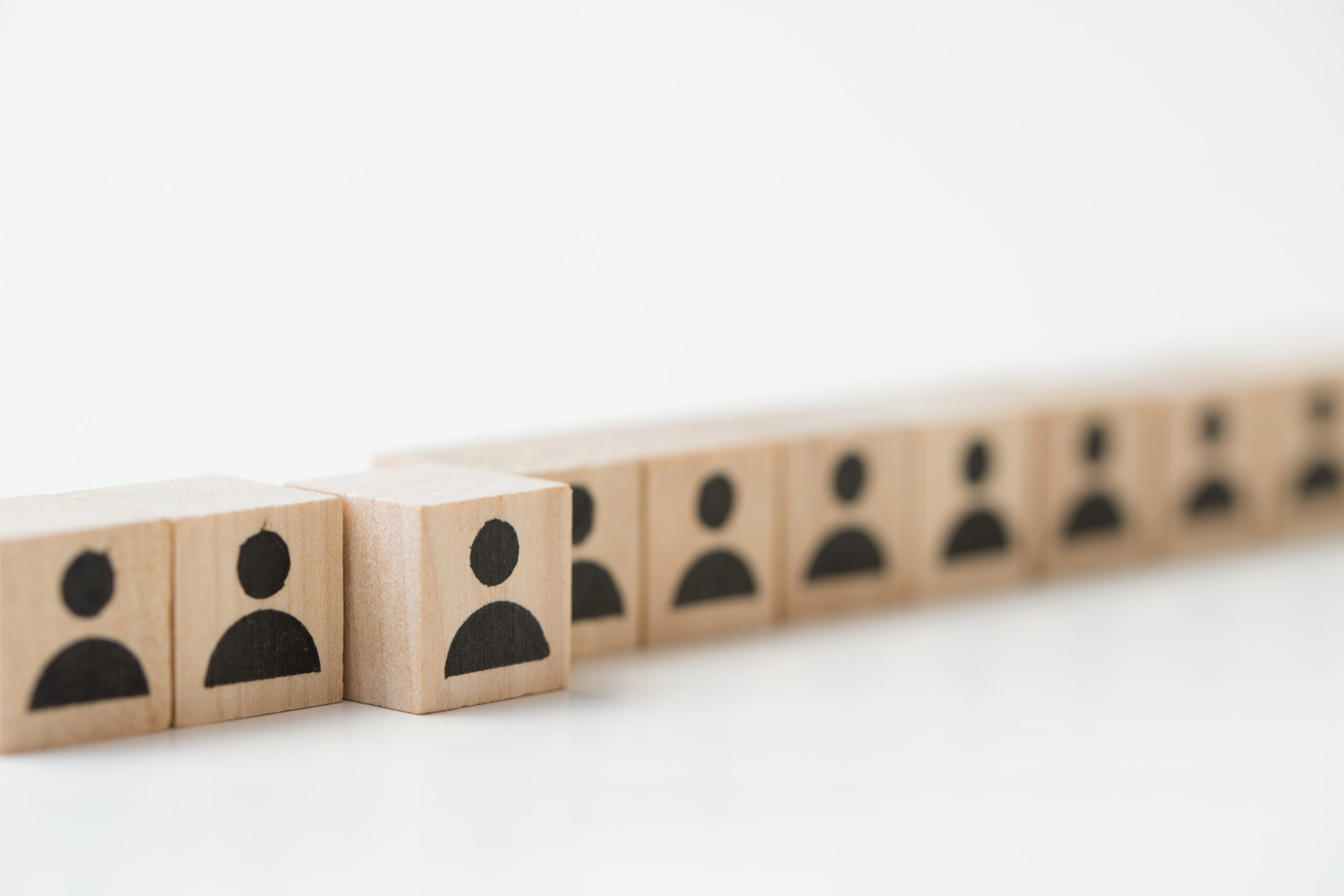 wooden blocks displaying abstract people figures i 2026 09 23 00 24 09 utc scaled tronos